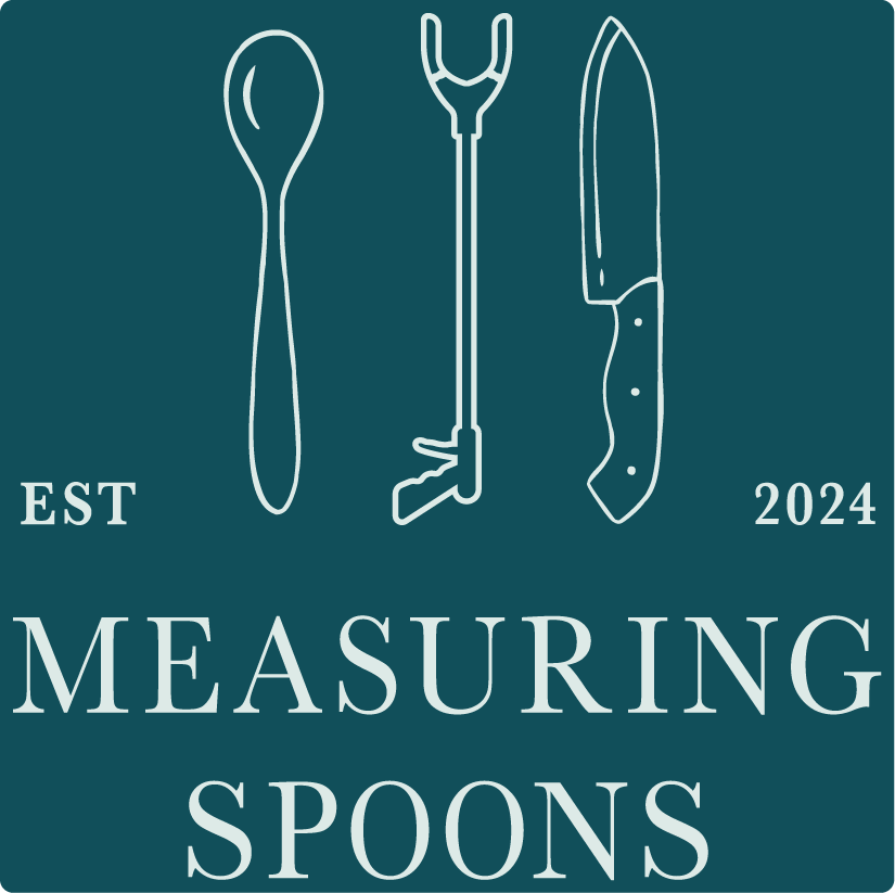 Measuring spoons established 2024. Spoon, grabber, and knife, above uppercase text on two lines.